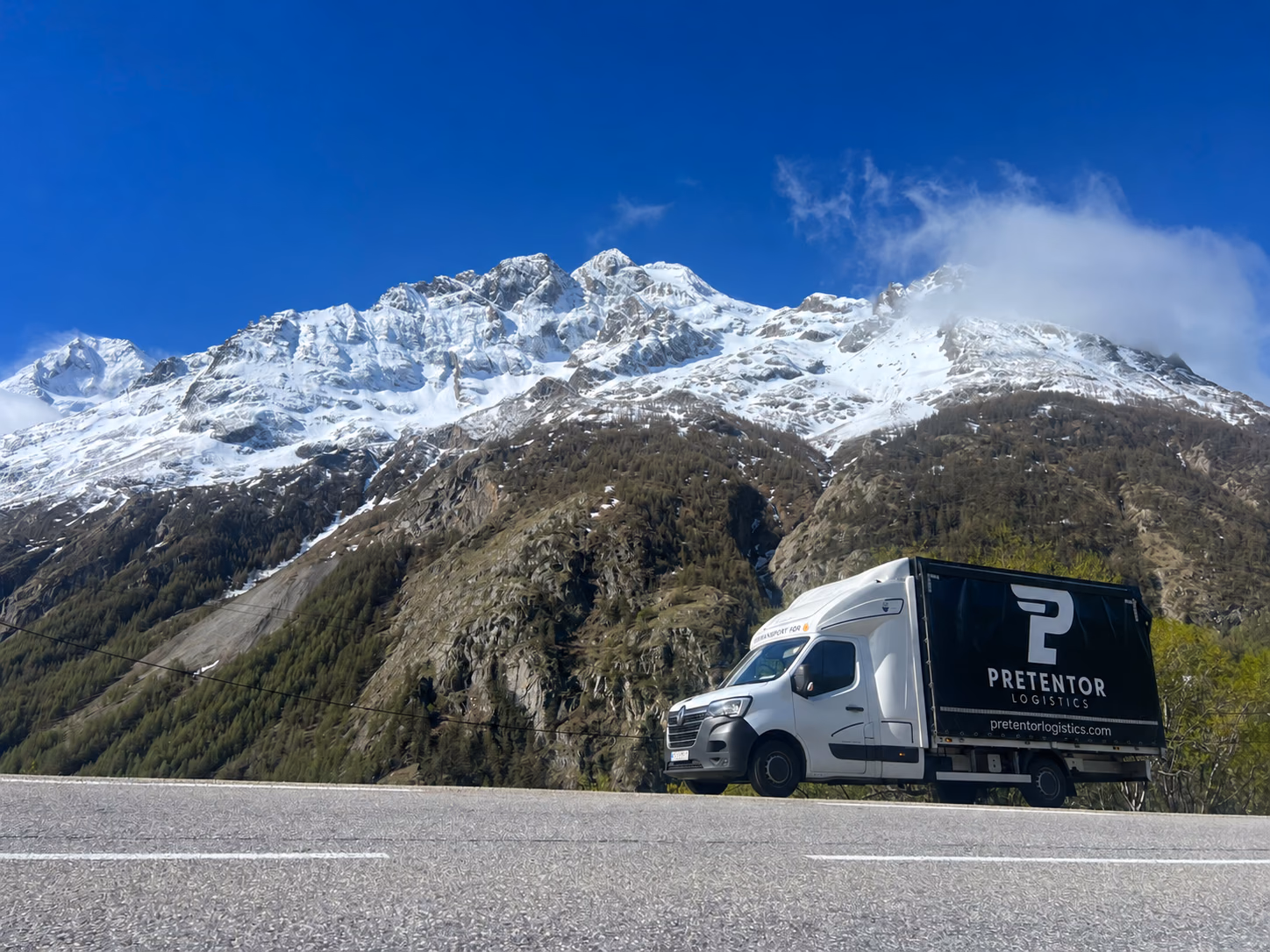 Pretentor Logistics vehicle travelling on a European road